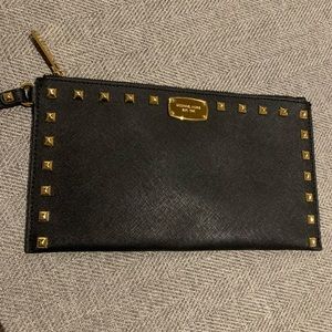 Michael Kors Black Wristlet with gold studs